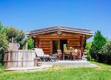 Rugged log cabin with a private hot tub