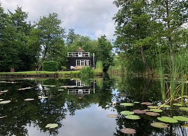 Vrijstaand huisje met eigen sloot - 1