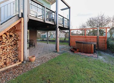 Stijlvolle strandvilla met hottub en uitzicht - 13