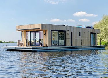 Ecological houseboat with its own boat