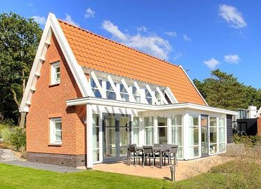 Vakantievilla met sauna bij een natuurmeer