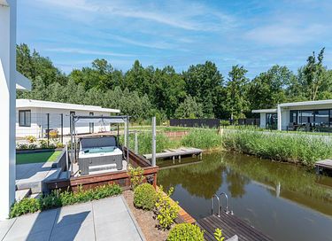 Sfeervolle villa met jacuzzi aan het water - 27