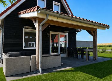 Holiday home with a covered porch in Zeeland - 2