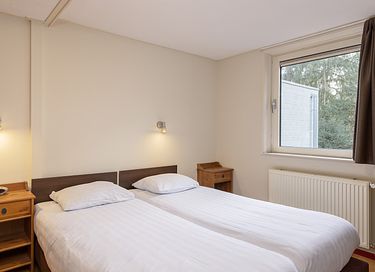 8-persoons huisje in een bosrijke omgeving - 8