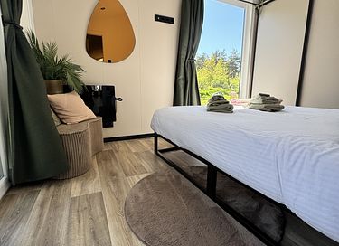 Luxuriöse Lodge mit Whirlpool und Waldblick - 25