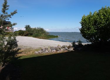 Stijlvolle strandvilla met hottub en uitzicht - 15
