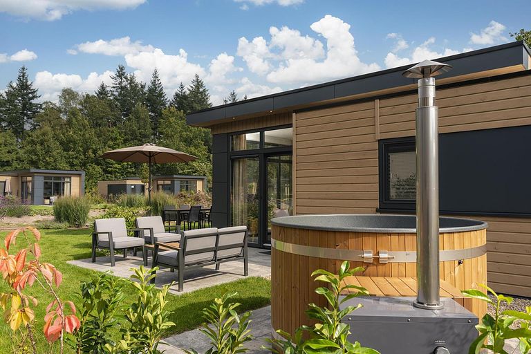 Ontspan in dit vakantiehuis met privé hottub - 1