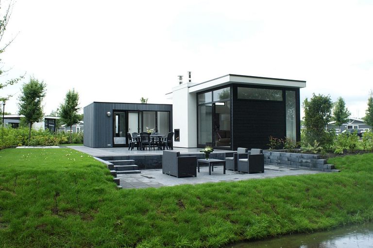 Maison de vacances avec terrasse dans un beau parc - 1