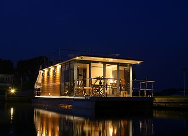 Stay on a luxury houseboat with a slide - 2