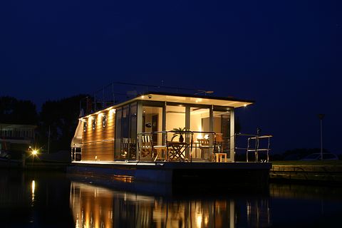 Stay on a luxury houseboat with a slide - 2