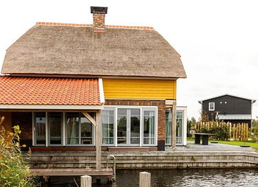 Luxe watervilla met aanlegsteiger - 6