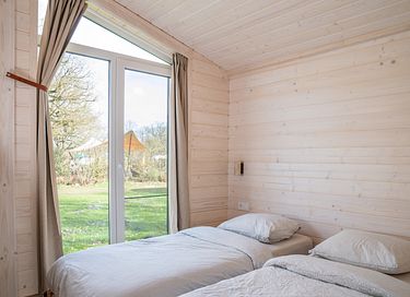 Stilvolle Lodge aus Holz in schöner Umgebung - 8