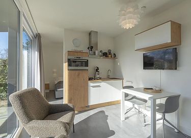 Bungalow met omheinde tuin bij de kust - 11