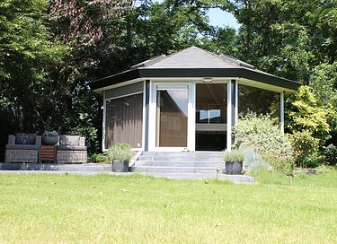 Suite jardin luxueuse dans un hôtel-boutique à Texel