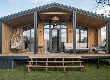 Stylish wooden lodge in beautiful surroundings