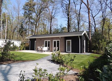 Maison de vacances dans un parc boisé