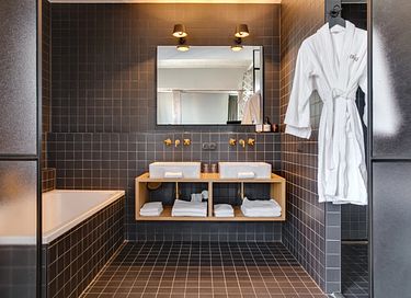 Luxe suite (45m2) in boutique hotel met bad - 16