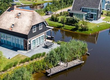 Luxe watervilla met aanlegsteiger - 4