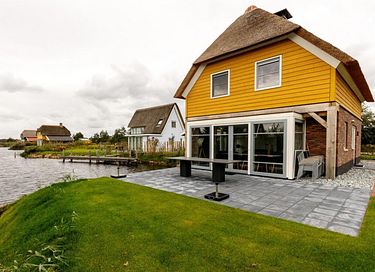 Luxe watervilla met aanlegsteiger - 7